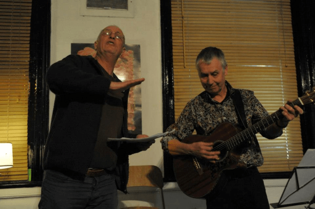 Adrian Grimm ( left) practices his "Kung Fu Fighting", Carl Douglas, routine,John Grimm (right) plays something else.